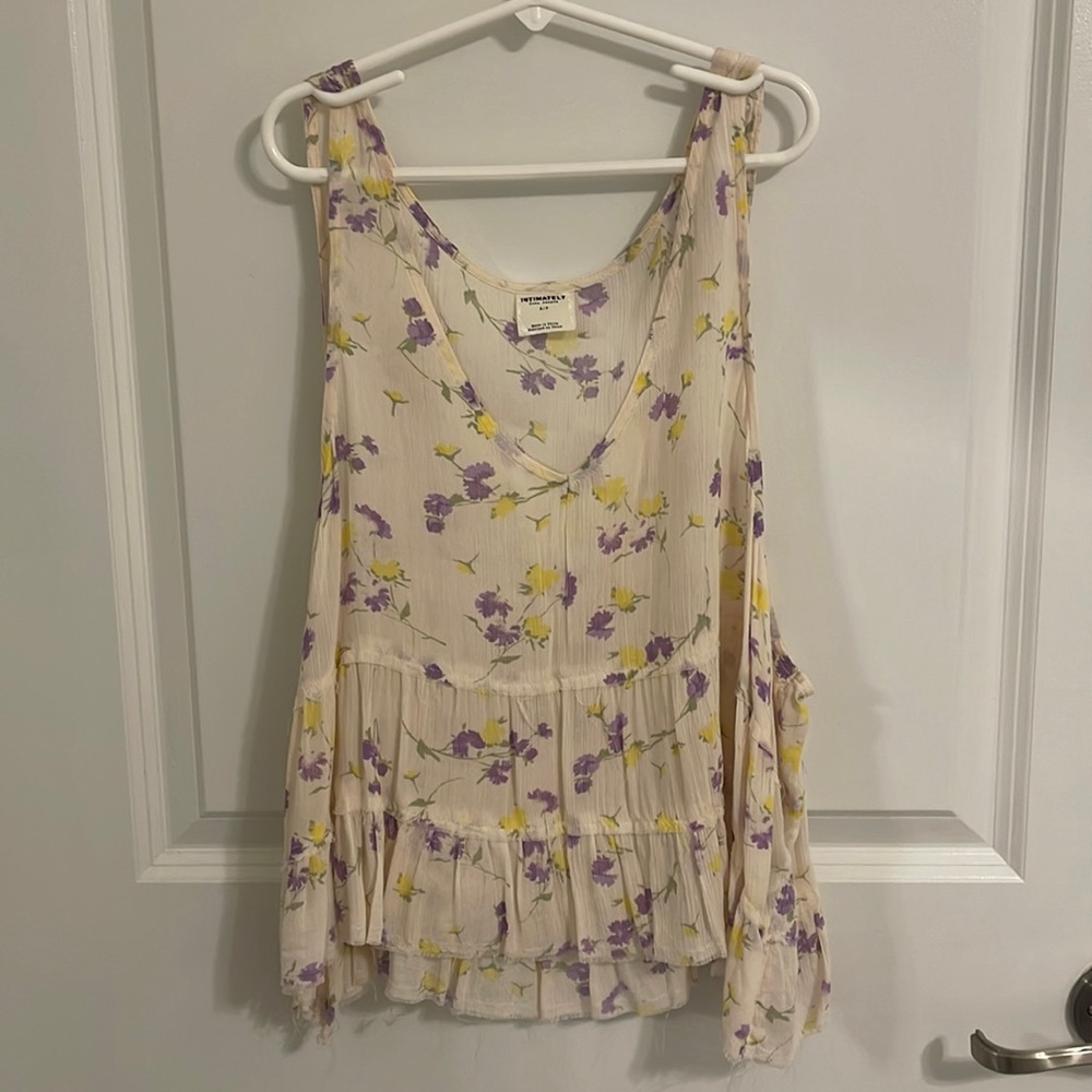 Free people’s Intimately line. Floral cropped ruffle hem. Unlined.